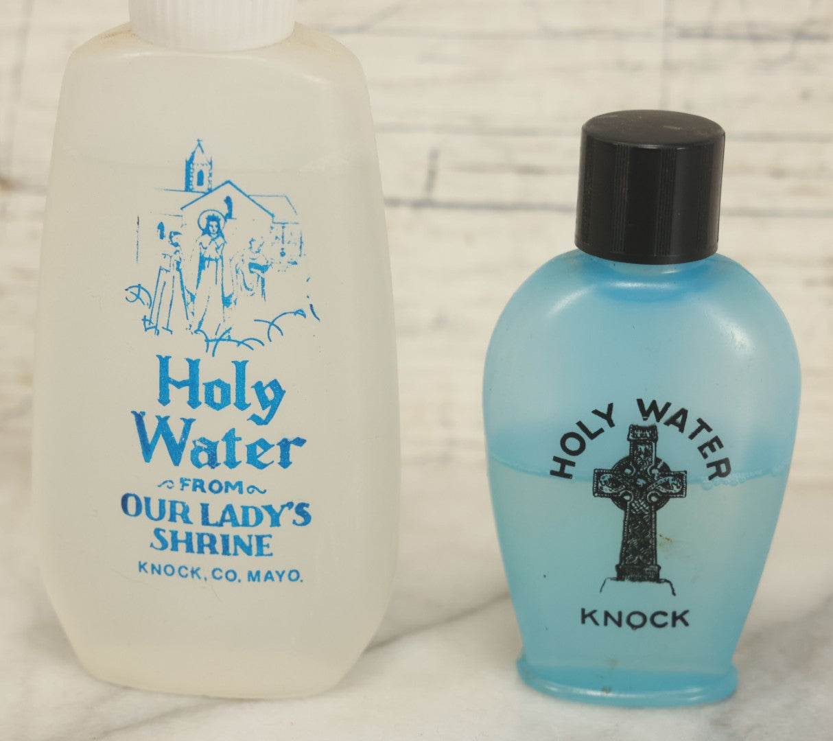 Lot 067 - Pair Of Vintage Holy Water Plastic Bottles From Sanctuary Of Our Lady Of Knock, Knock County, Mayo, Ireland