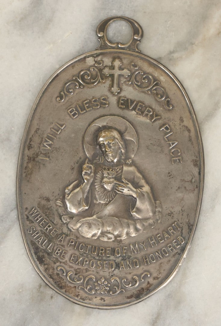 Lot 070 - Pair Of Vintage Pressed Metal Religious Plaques Including Jesus "I Will Bless Every Place" Home Blessing Plaque