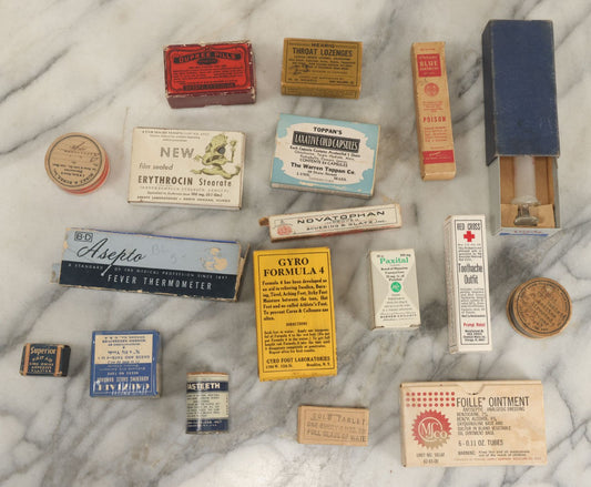 Lot 074 - Grouping Of 18 Boxed Pharmacy Items Including Ideal Syringe, Toppan's Laxative Cold Capsules, Mearig Throat Lozenges, And More