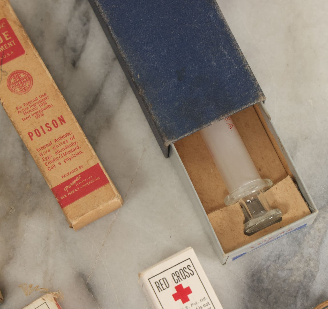 Lot 074 - Grouping Of 18 Boxed Pharmacy Items Including Ideal Syringe, Toppan's Laxative Cold Capsules, Mearig Throat Lozenges, And More