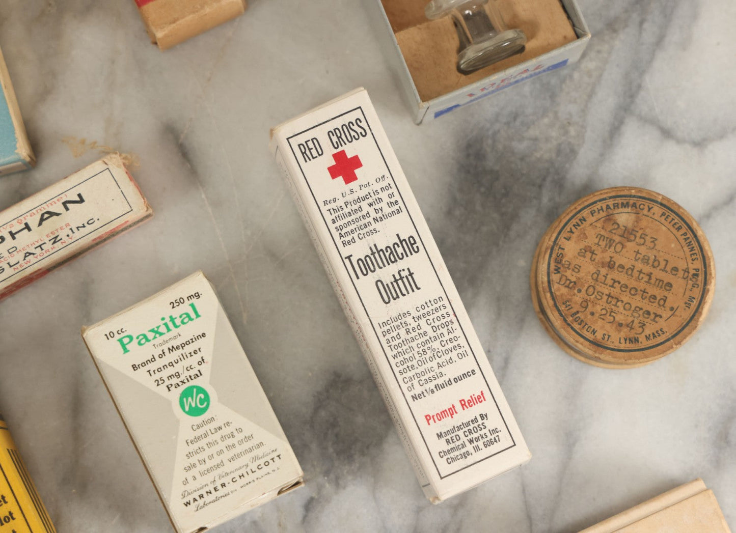 Lot 074 - Grouping Of 18 Boxed Pharmacy Items Including Ideal Syringe, Toppan's Laxative Cold Capsules, Mearig Throat Lozenges, And More