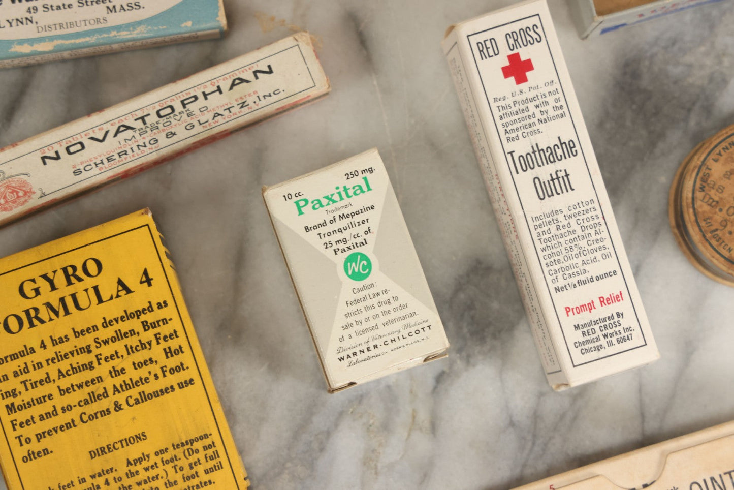 Lot 074 - Grouping Of 18 Boxed Pharmacy Items Including Ideal Syringe, Toppan's Laxative Cold Capsules, Mearig Throat Lozenges, And More