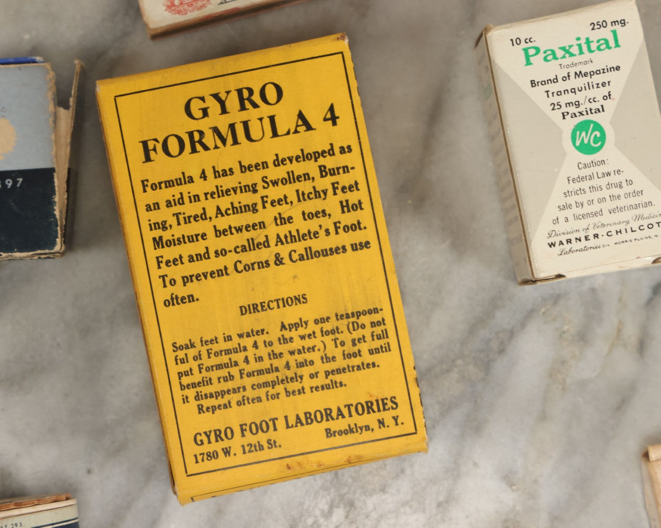 Lot 074 - Grouping Of 18 Boxed Pharmacy Items Including Ideal Syringe, Toppan's Laxative Cold Capsules, Mearig Throat Lozenges, And More