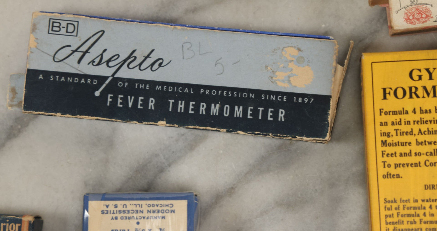 Lot 074 - Grouping Of 18 Boxed Pharmacy Items Including Ideal Syringe, Toppan's Laxative Cold Capsules, Mearig Throat Lozenges, And More