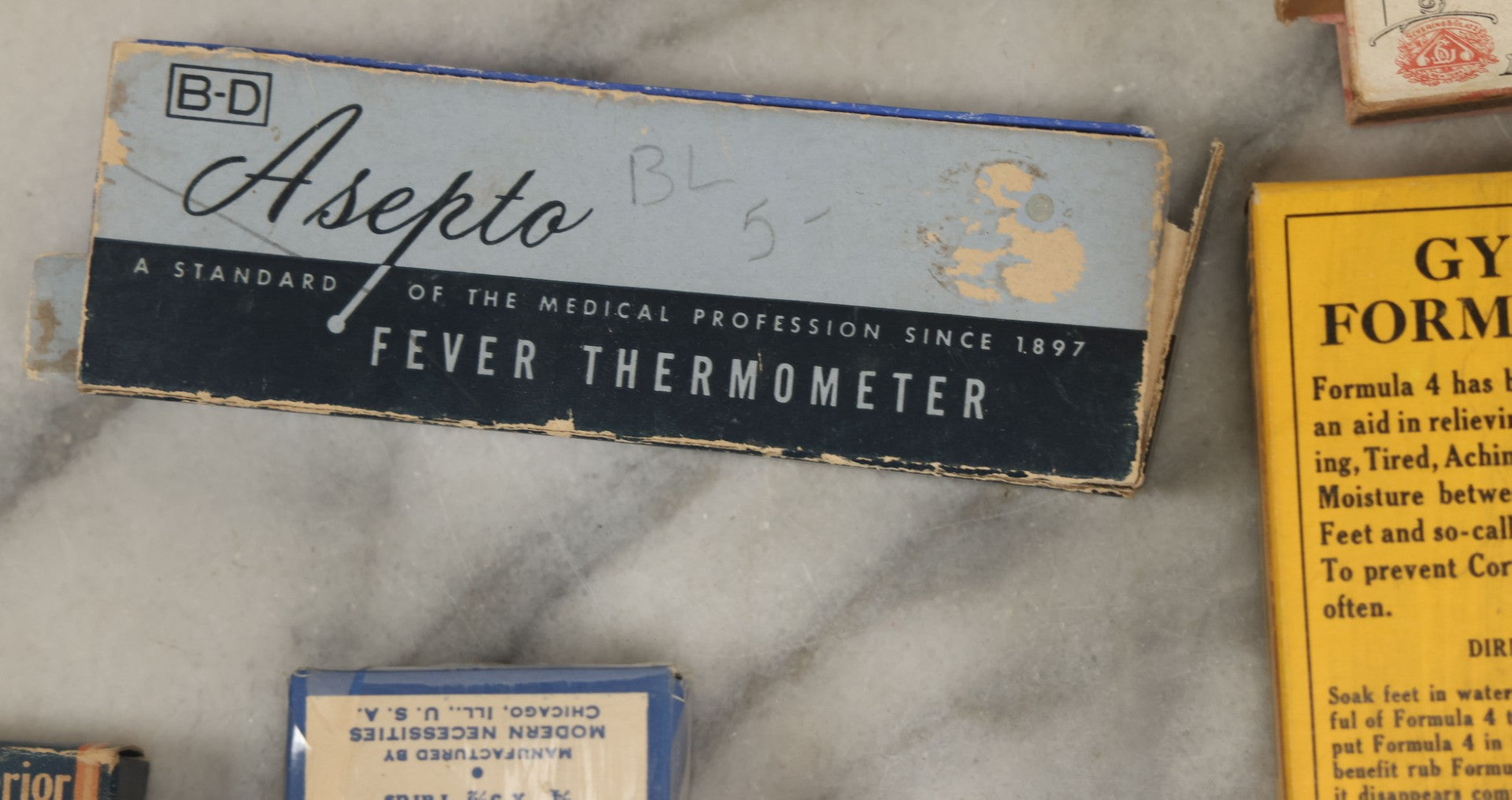 Lot 074 - Grouping Of 18 Boxed Pharmacy Items Including Ideal Syringe, Toppan's Laxative Cold Capsules, Mearig Throat Lozenges, And More