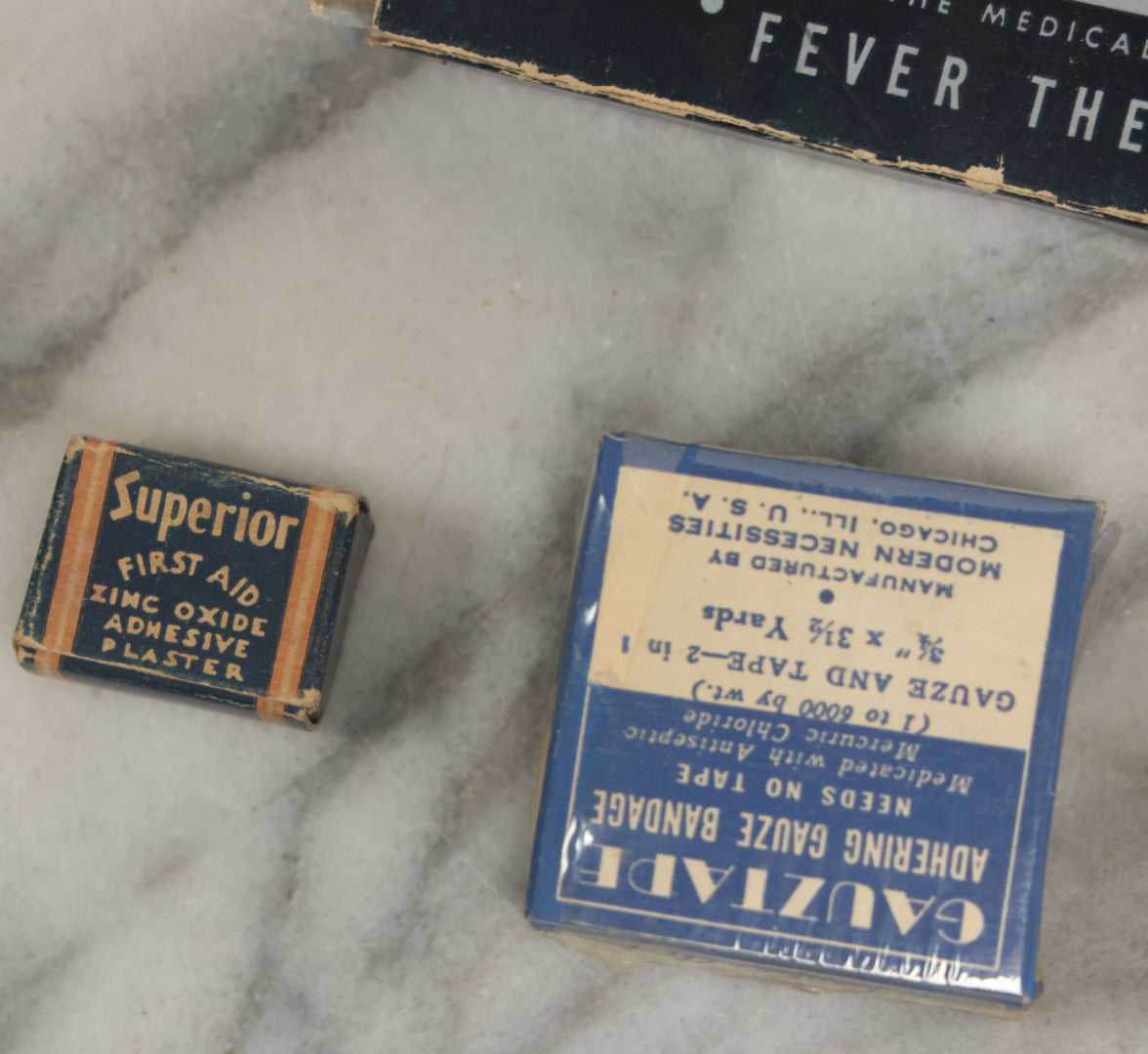 Lot 074 - Grouping Of 18 Boxed Pharmacy Items Including Ideal Syringe, Toppan's Laxative Cold Capsules, Mearig Throat Lozenges, And More