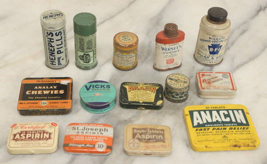 Lot 076 - Grouping Of 14 Pharmacy Tins (Smaller Size) Including Analax Chewies, Doan's Pills, And Vicks Vaporub