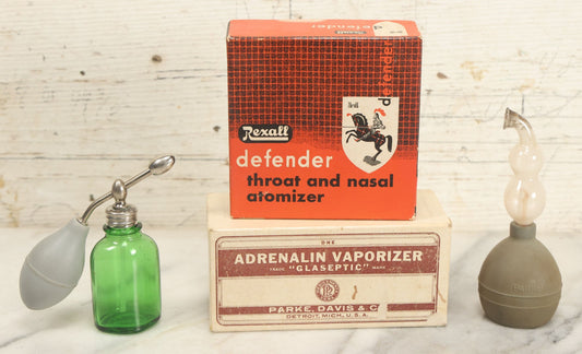 Lot 078 - Pair Of Vintage Medical Vaporizers In Original Boxes Including Adrenalin "Glaseptic" Vaporizer, And Rexall Defender Throat And Nasal Atomizer