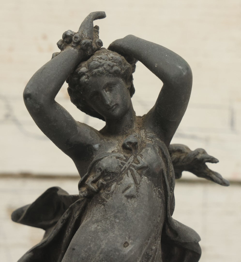 Lot 095 - Antique Spelter Statue Of Woman In Windswept Gown, Dancing, With Stars Around Spelter Base, On Wooden Pedestal
