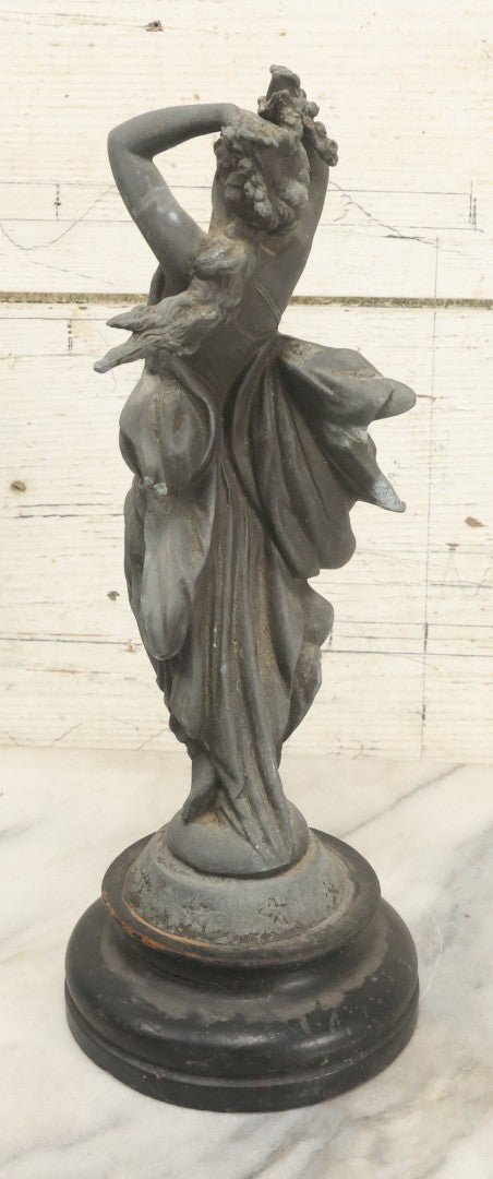 Lot 095 - Antique Spelter Statue Of Woman In Windswept Gown, Dancing, With Stars Around Spelter Base, On Wooden Pedestal