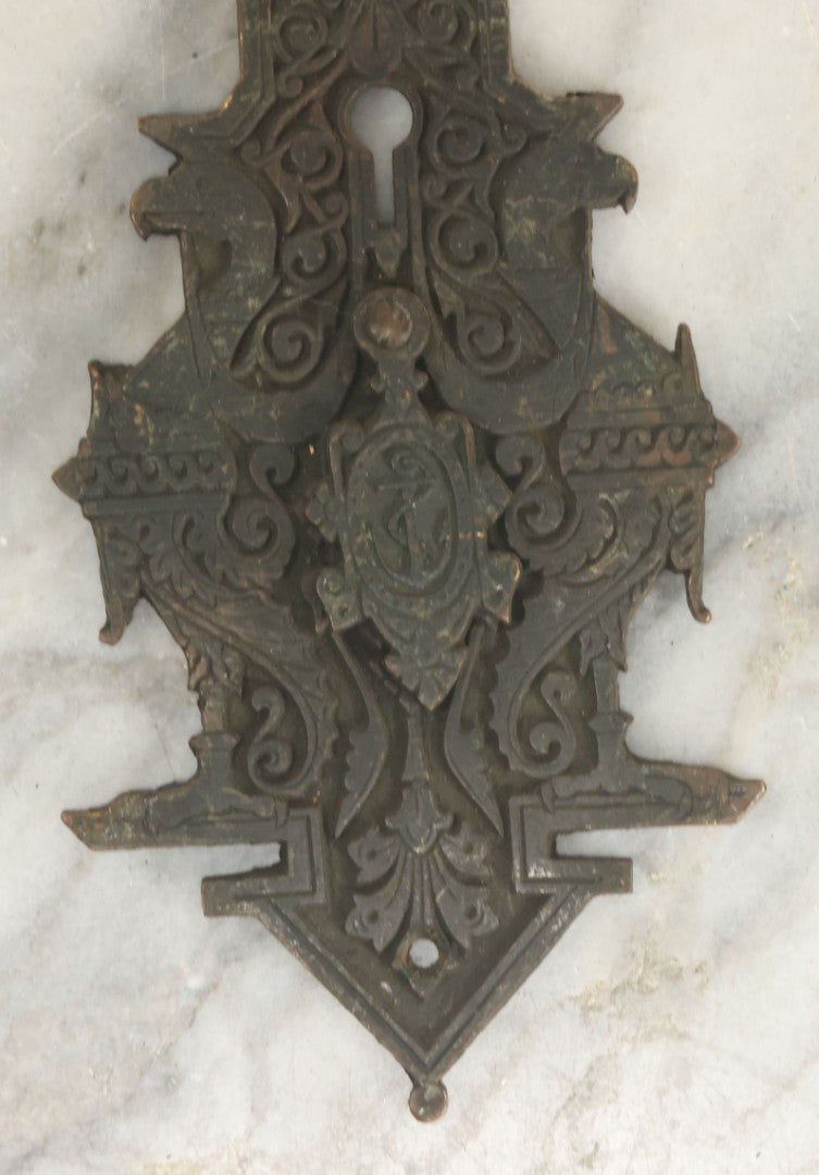 Lot 098 - Antique Cast Metal Door Knob Plate And Escutcheon With Bird And Anchor Motif, Nautical Swinging Keyhole Cover