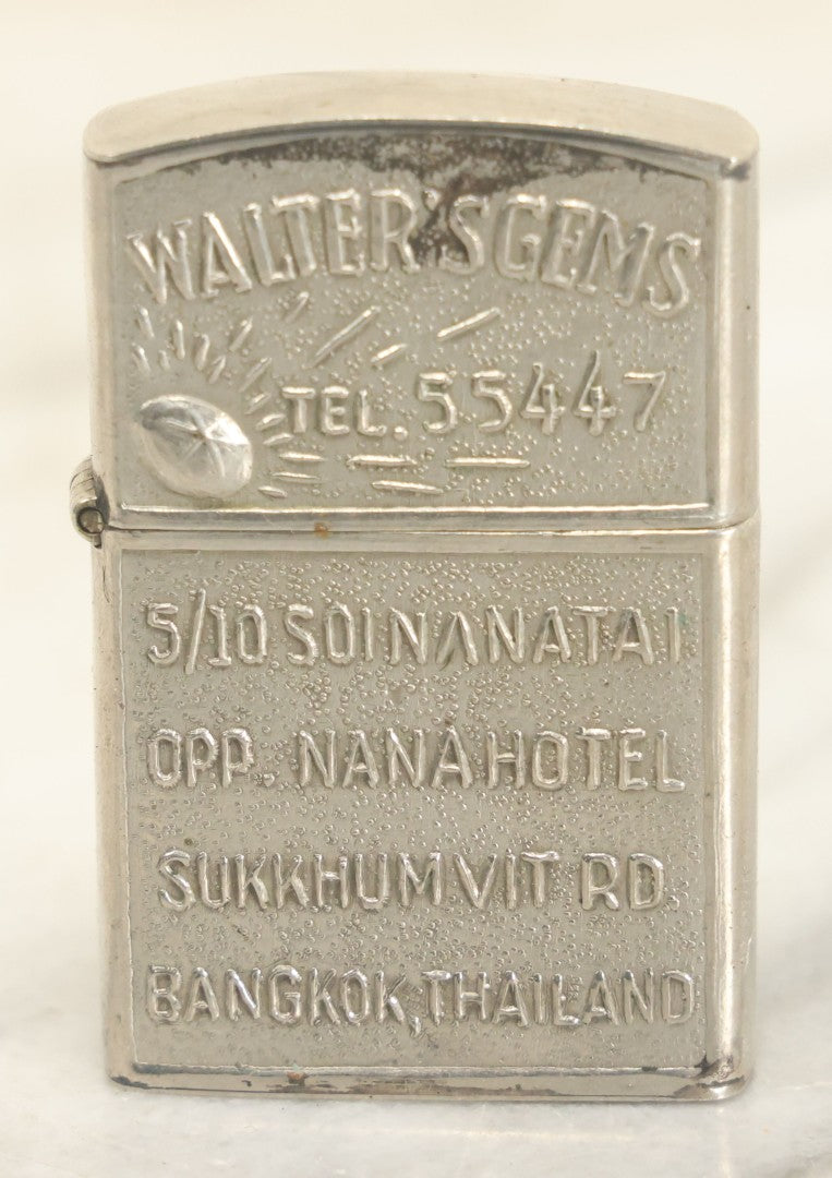 Lot 102 - Walter's Gems Advertising Lighter From Bangkok, Thailand, With Dancing Deities Motif