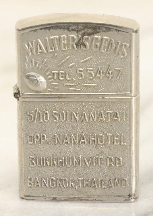 Lot 102 - Walter's Gems Advertising Lighter From Bangkok, Thailand, With Dancing Deities Motif