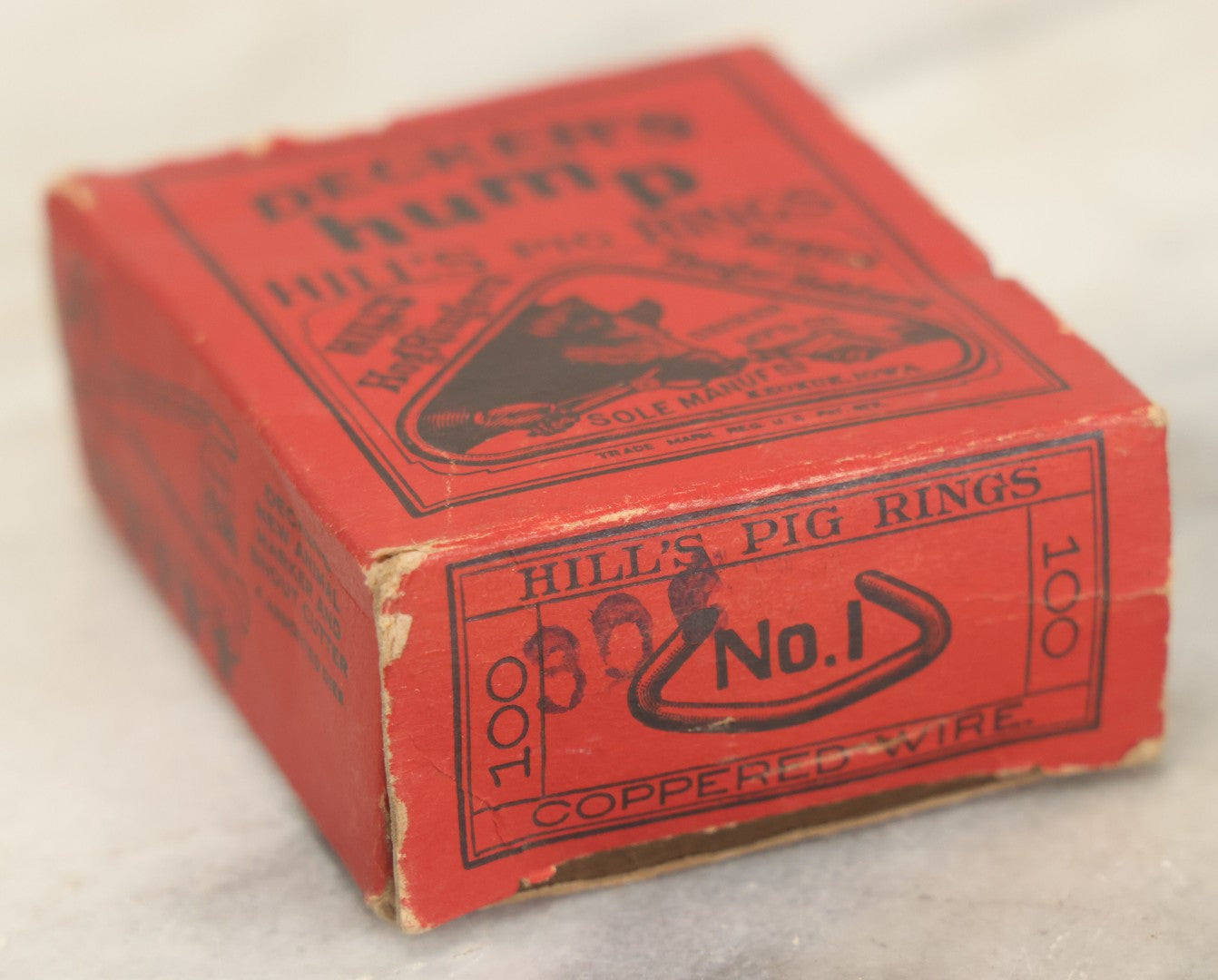 Lot 106 - Vintage Decker's Hump Hill's Copper Pig Nose Rings, No. 1, In Original Advertising Box With Contents, Keokuk, Iowa