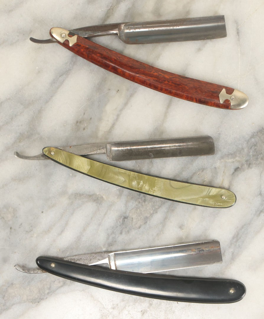 Lot 109 - Grouping Of Three Vintage Straight Shaving Razors Including Keenkutter With Wood Grain Handle, Blue Grass With Black Handle, And Western States Cutlery Co. With Green Handle