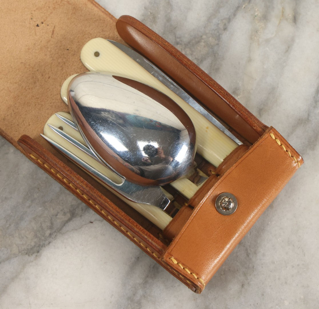 Lot 111 - Vintage Leather Travel Pouch With Three Pieces Of Folding Cutlery, J.P. Monogram