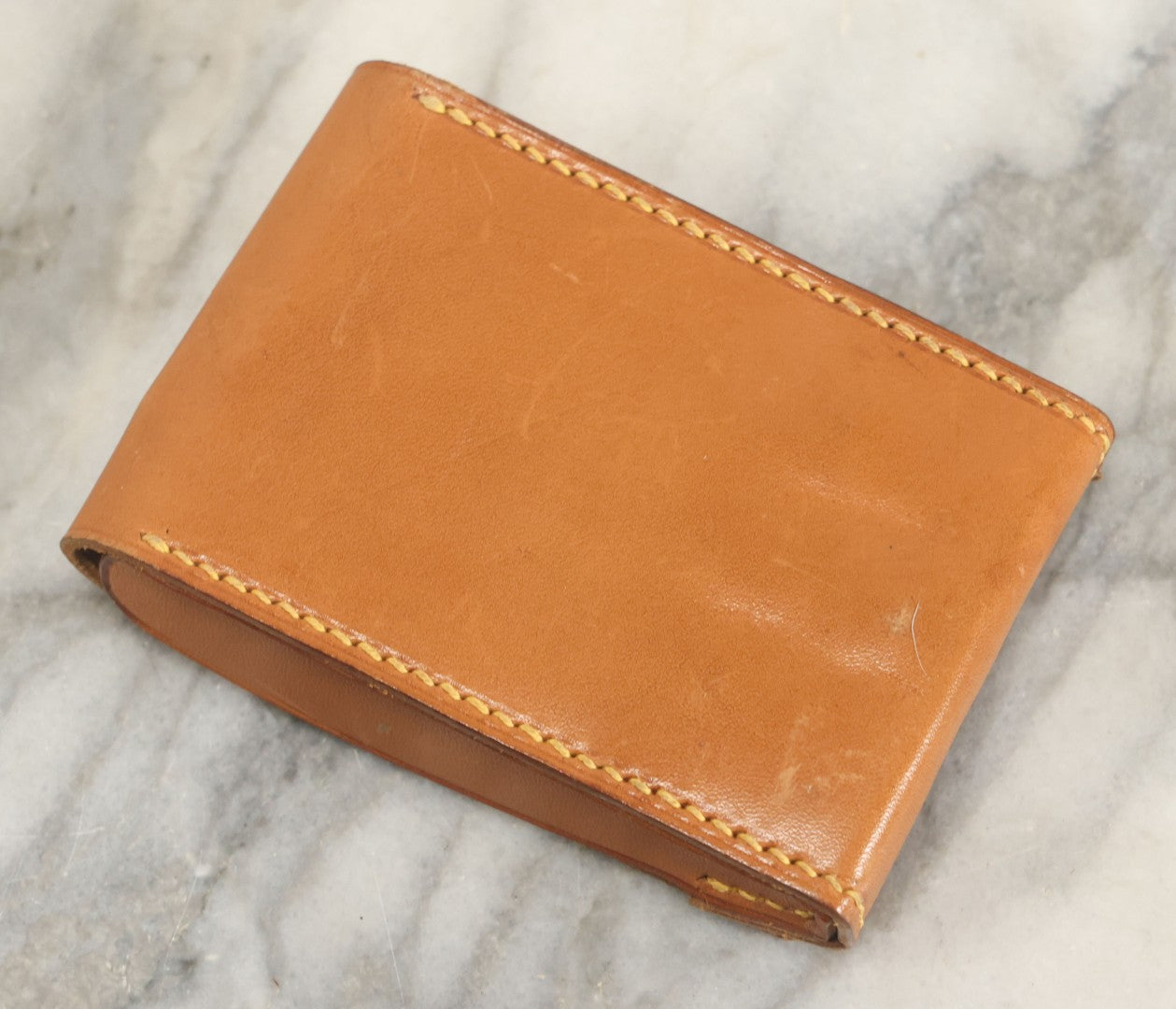 Lot 111 - Vintage Leather Travel Pouch With Three Pieces Of Folding Cutlery, J.P. Monogram