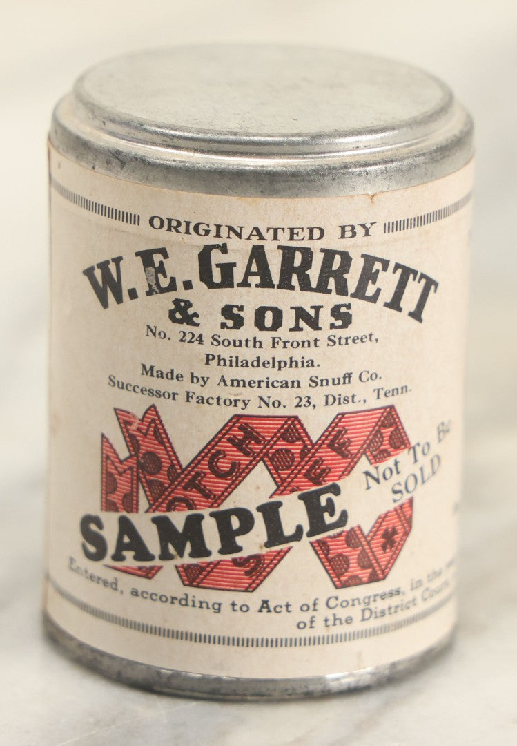 Lot 112 - Antique W.E. Garrett & Sons Sealed Snuff Sample Jar Tin With Paper Label, 1-1/4" Ounces, Philadelphia, Pennsylvania
