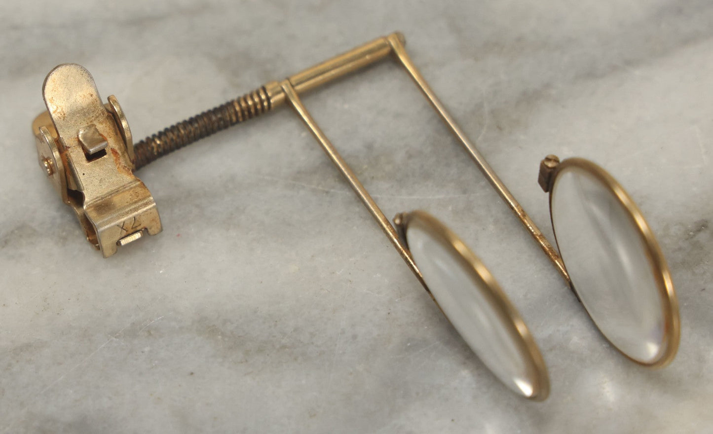 Lot 116 - Vintage Brass Clamping Magnifying Tool Glasses Attachment With 4X And 7X Lens, Marked B.L.