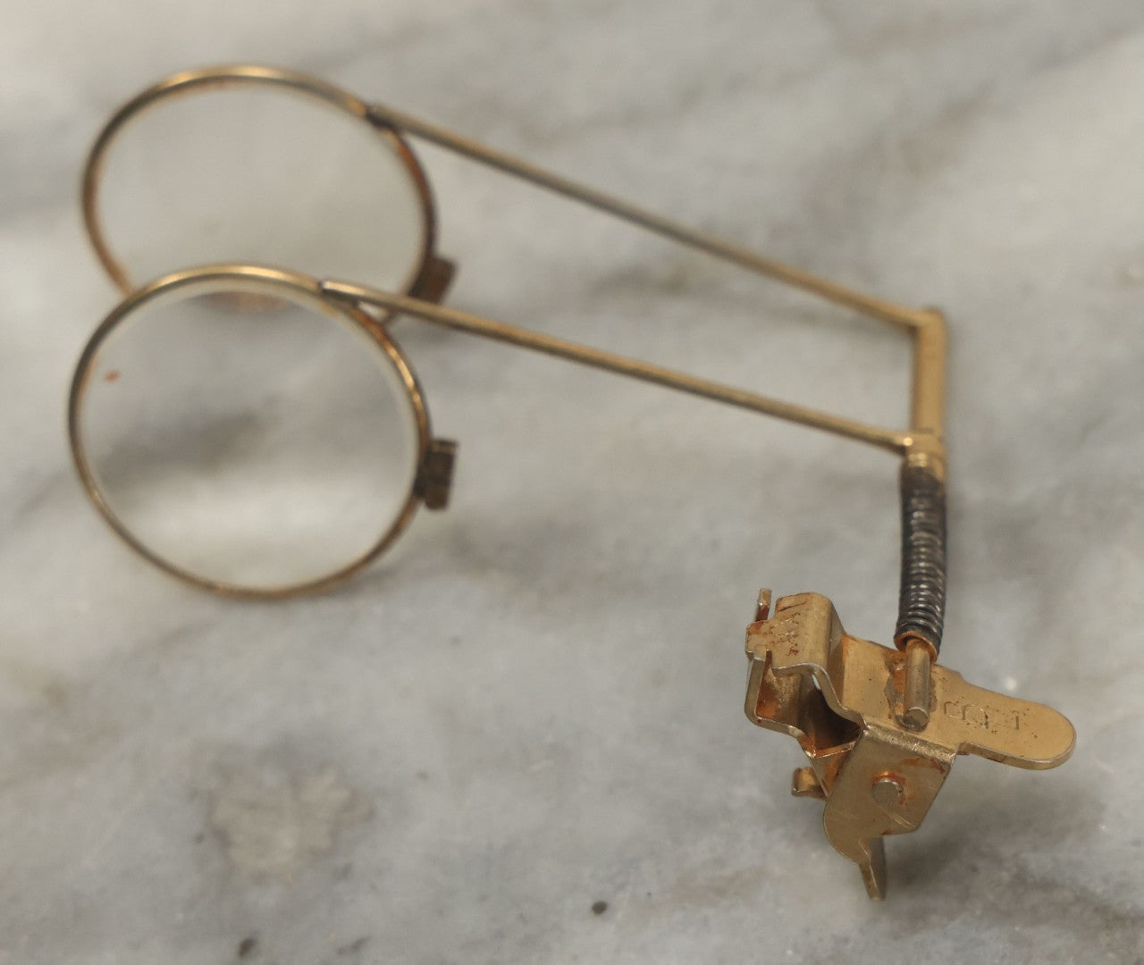 Lot 116 - Vintage Brass Clamping Magnifying Tool Glasses Attachment With 4X And 7X Lens, Marked B.L.