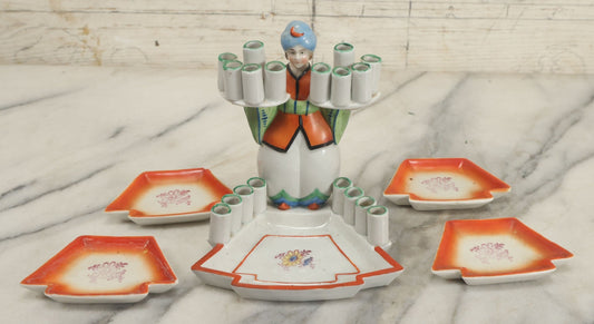 Lot 122 - Vintage Porcelain Cigarette Holder With Man In Turban, With Room For 18 Cigarettes, Including Four Individual Ashtrays, Marked Germany, No. 1503