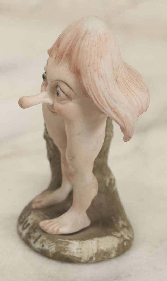 Lot 123 - Vintage Painted Bisque Grotesque Whimsical Character Named "Buzi" With Long Nose 