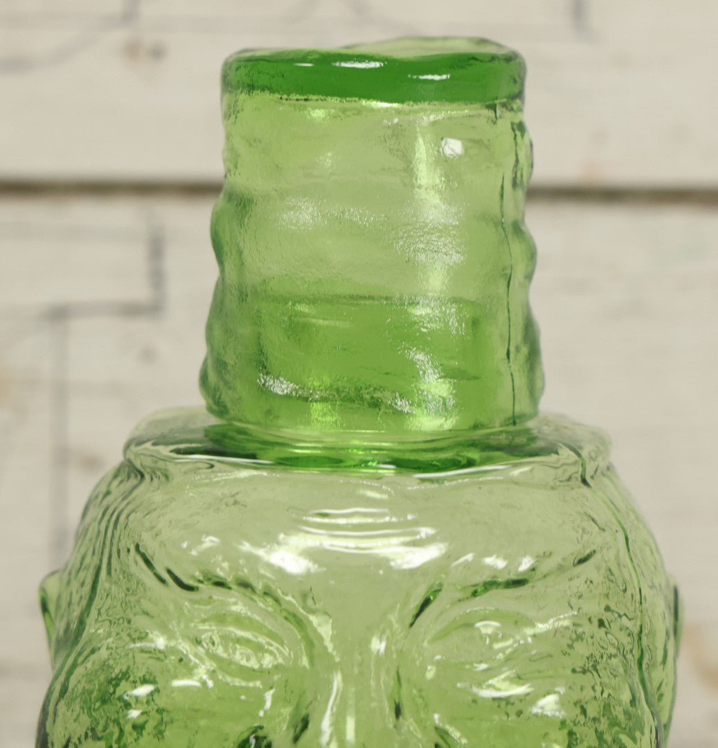 Lot 128 - Vintage Green Translucent Glass Character Judge With Portly, Jolly Man, With Drinking Glass Lid