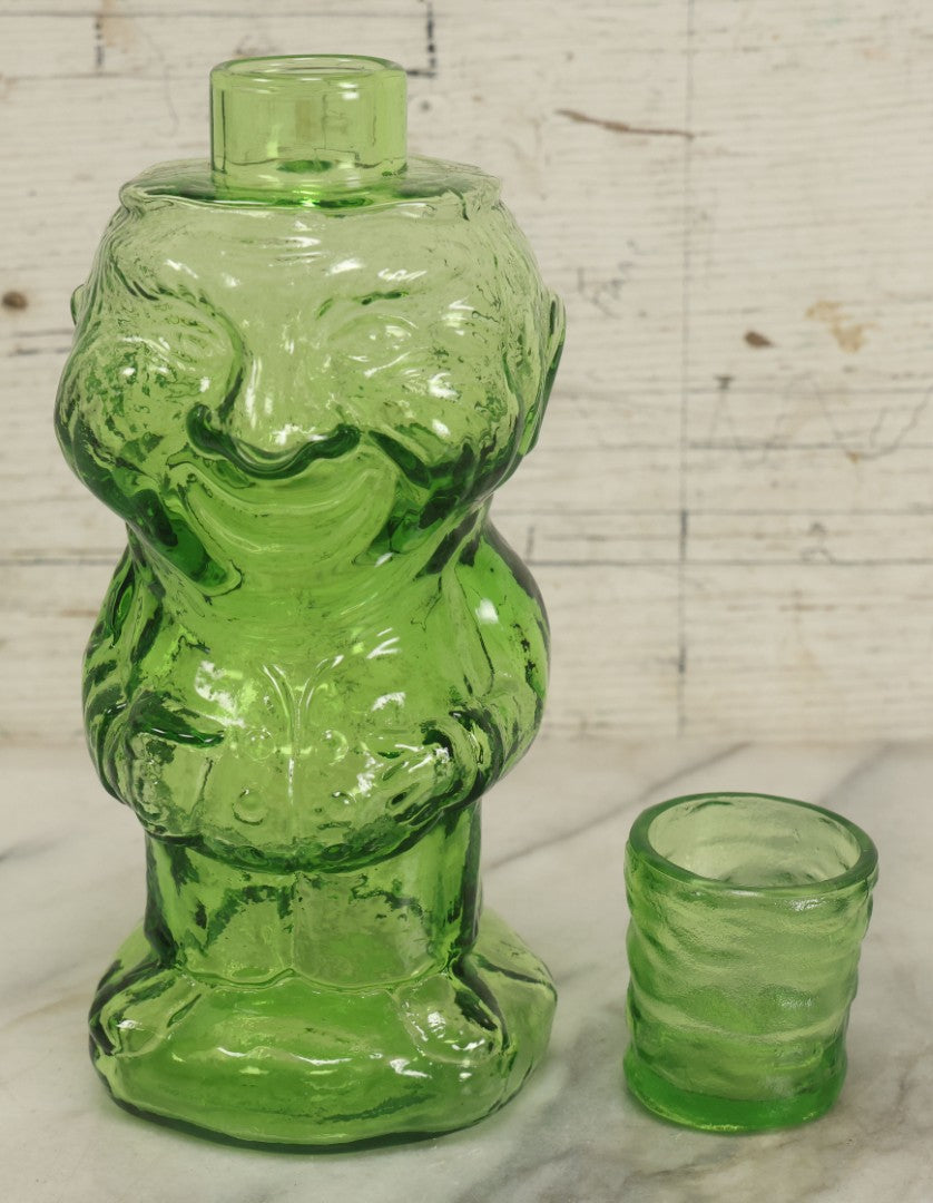 Lot 128 - Vintage Green Translucent Glass Character Judge With Portly, Jolly Man, With Drinking Glass Lid