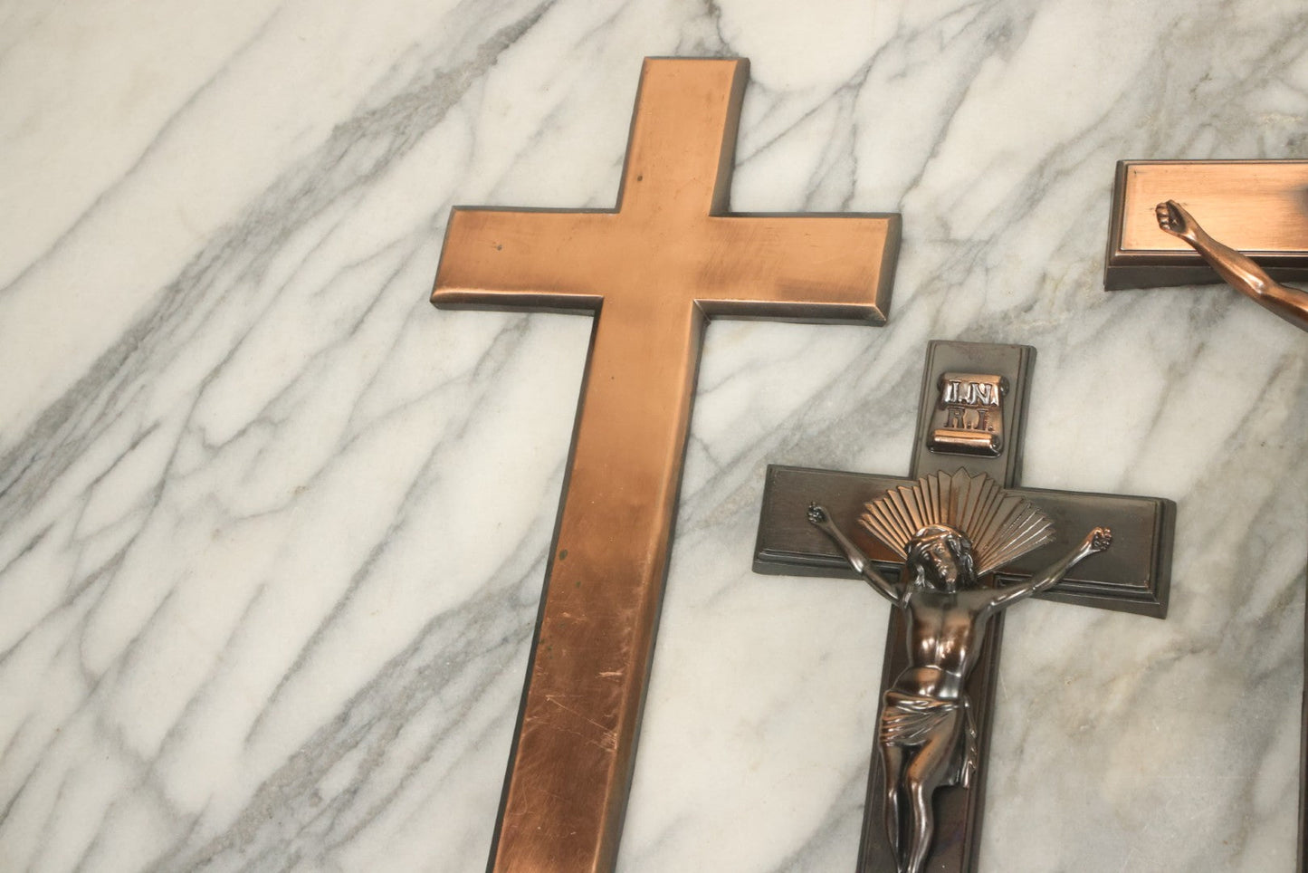 Lot 008 - Grouping Of Four Vintage Metal Funeral Casket Crucifixes Including Three With Jesus And One Without