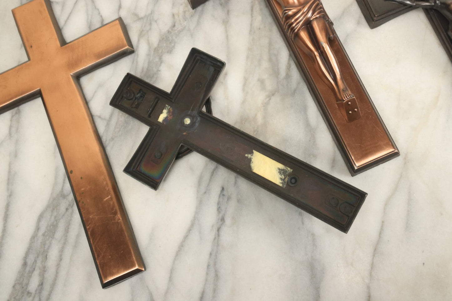 Lot 008 - Grouping Of Four Vintage Metal Funeral Casket Crucifixes Including Three With Jesus And One Without