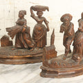 Lot 014 - Pair Of Antique Hand-Carved Folk Art Weighted Bookends Featuring Country Scenes Including Farmers, Farmhouse And Church, Note Various Losses Including Man's Arms