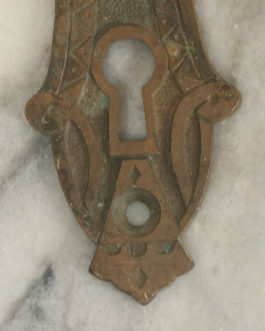 Lot 021 - Grouping Of Ten Antique Skeleton Keys And Two Ornate Antique Doorknob Mount Escutcheons, As Found