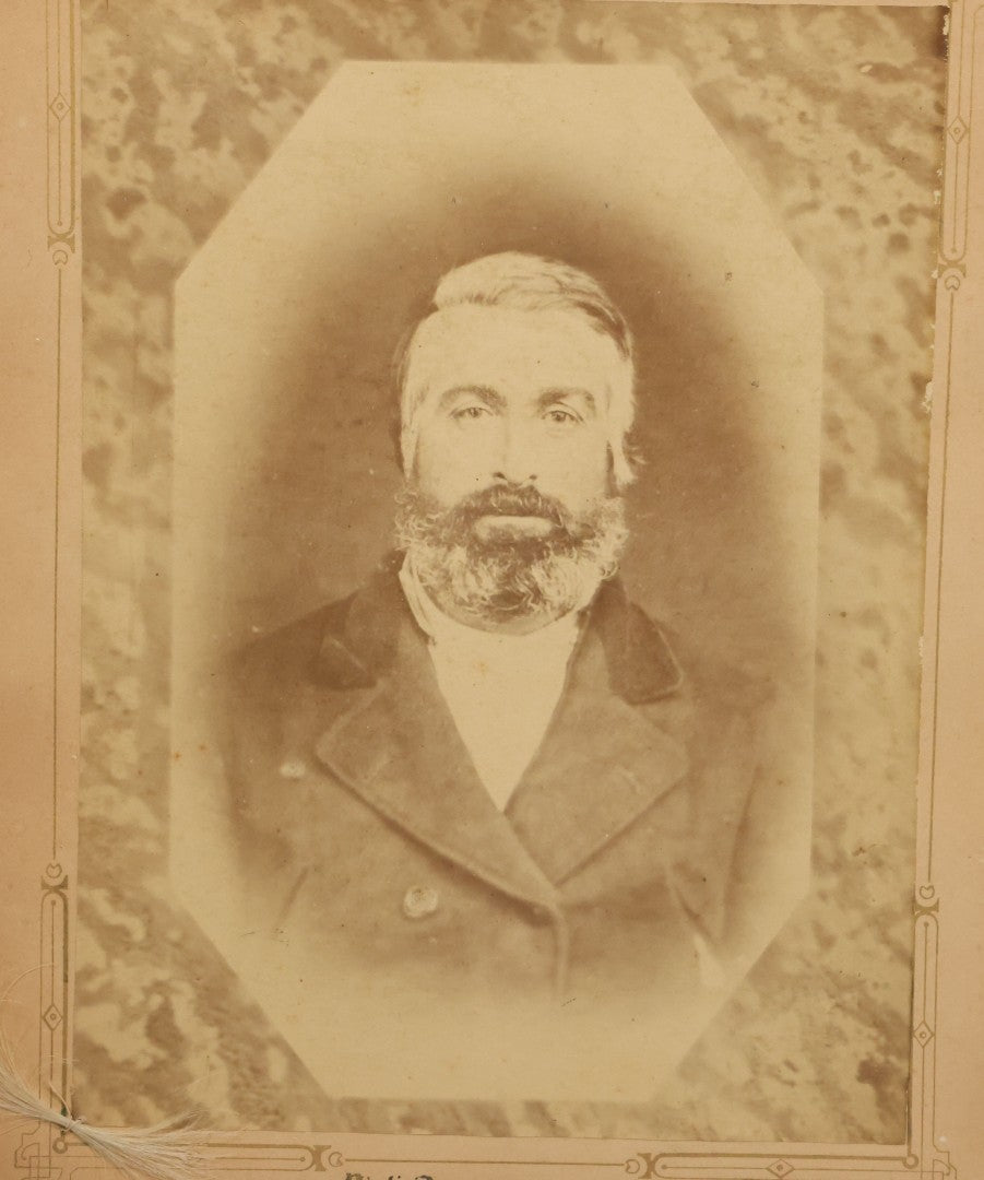 Lot 032 - Antique Boarded Photograph Of Bearded Man, With Lock Of Gray Hair, M.H. Anderson, Photographer, Harlansburg, Pennsylvania, Note Hair Likely Added Later, Professionally Framed In Modern Frame