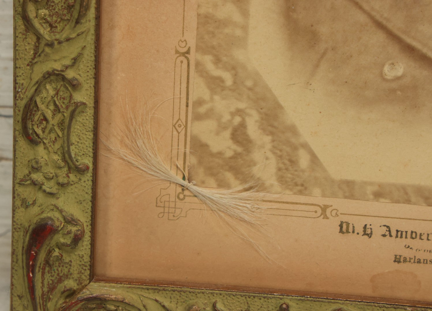 Lot 032 - Antique Boarded Photograph Of Bearded Man, With Lock Of Gray Hair, M.H. Anderson, Photographer, Harlansburg, Pennsylvania, Note Hair Likely Added Later, Professionally Framed In Modern Frame