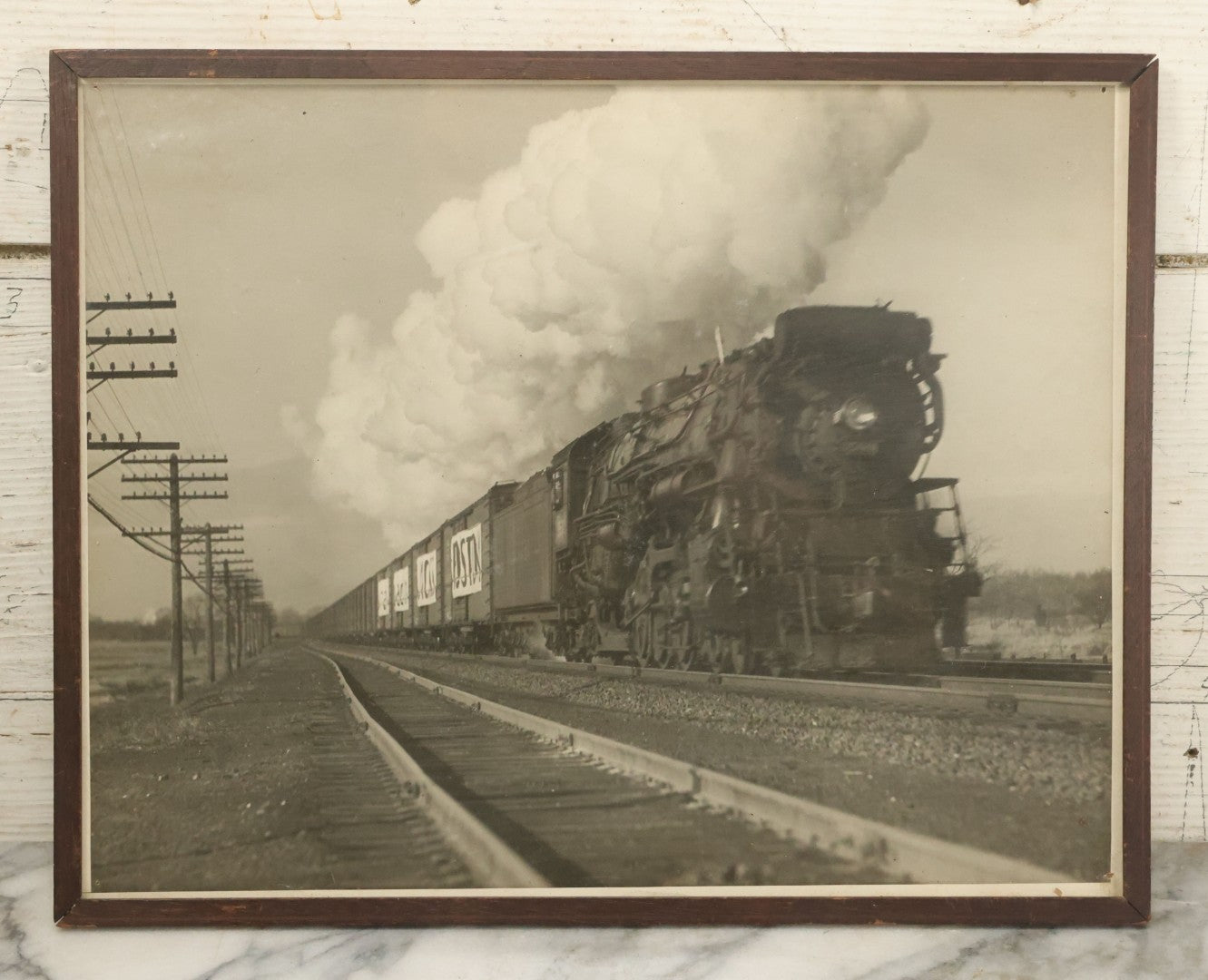 Lot 035 - Vintage Framed Glossy Photograph Of A Railroad Locomotive Train Alongside Power Lines, Circa 1920, In Frame