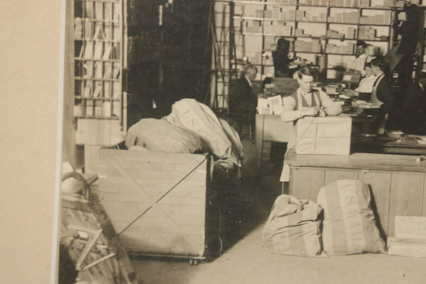 Lot 037 - Antique Boarded Photograph Of Post Office Interior And Postal Workers, With Modern Mat, Shrink Wrapped