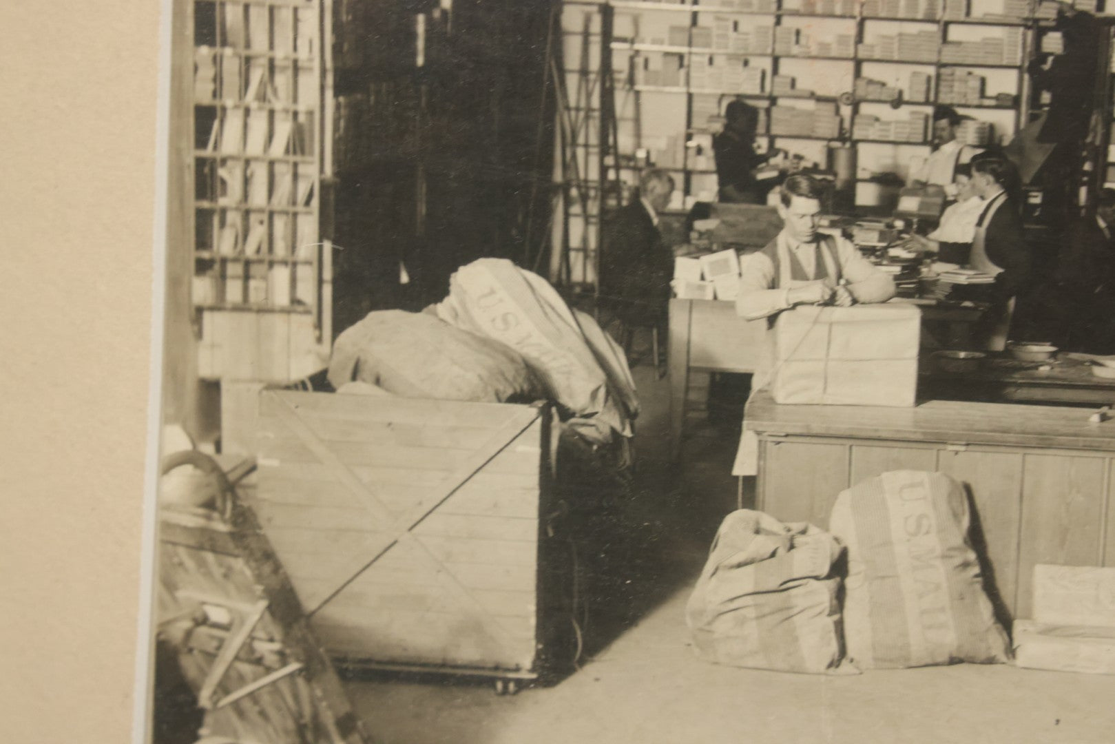 Lot 037 - Antique Boarded Photograph Of Post Office Interior And Postal Workers, With Modern Mat, Shrink Wrapped