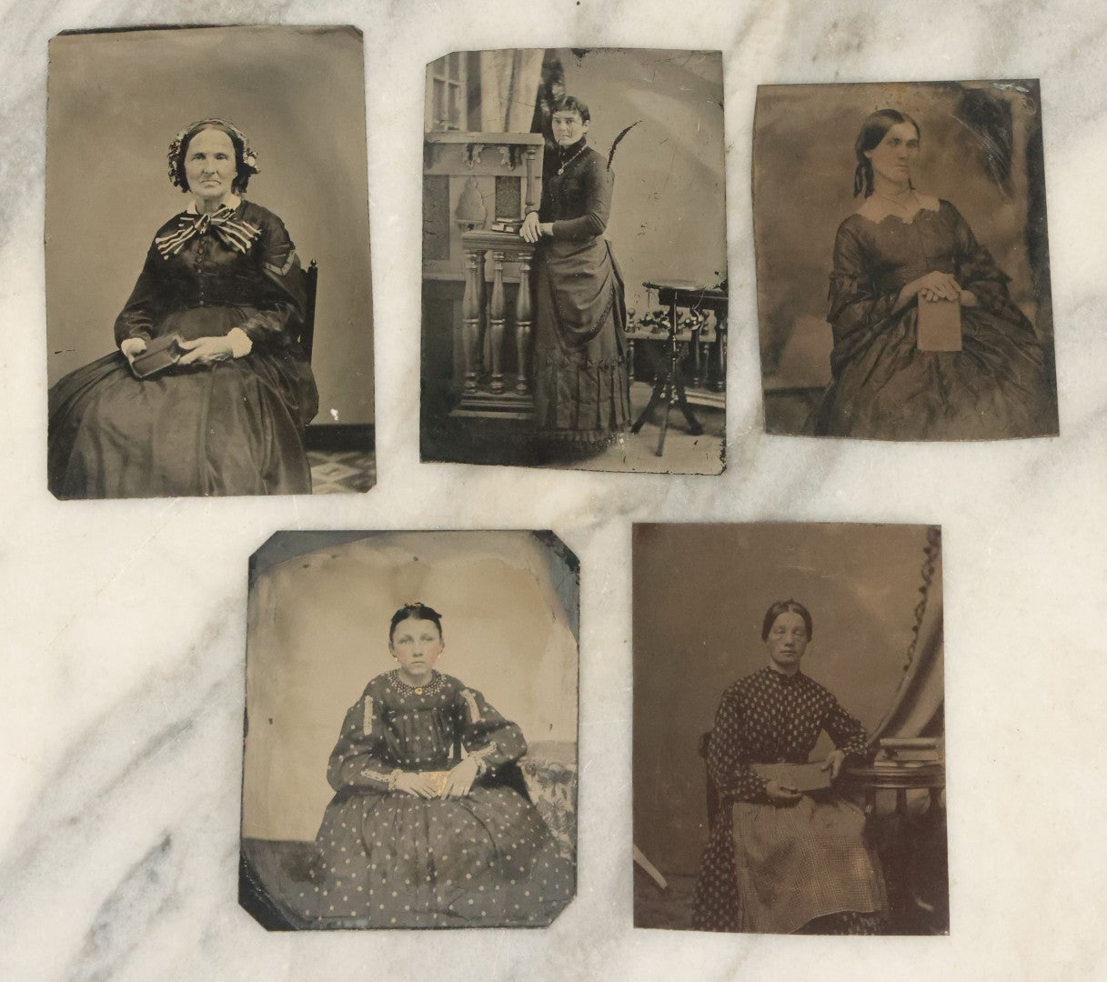 Lot 040 - Grouping Of Five Antique Tintype Photographs Of Women Posing With Books
