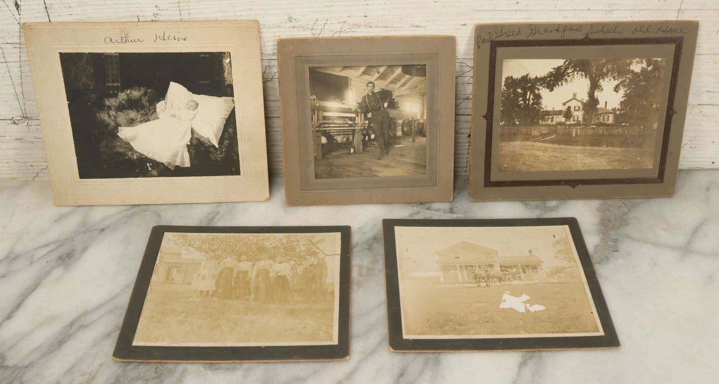 Lot 044 - Grouping Of Five Antique Boarded Photographs Including Worker Posing With Machinery, Exterior Of House, Women Standing By Tree, Horse-Drawn Carriage, And Baby
