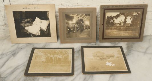 Lot 044 - Grouping Of Five Antique Boarded Photographs Including Worker Posing With Machinery, Exterior Of House, Women Standing By Tree, Horse-Drawn Carriage, And Baby