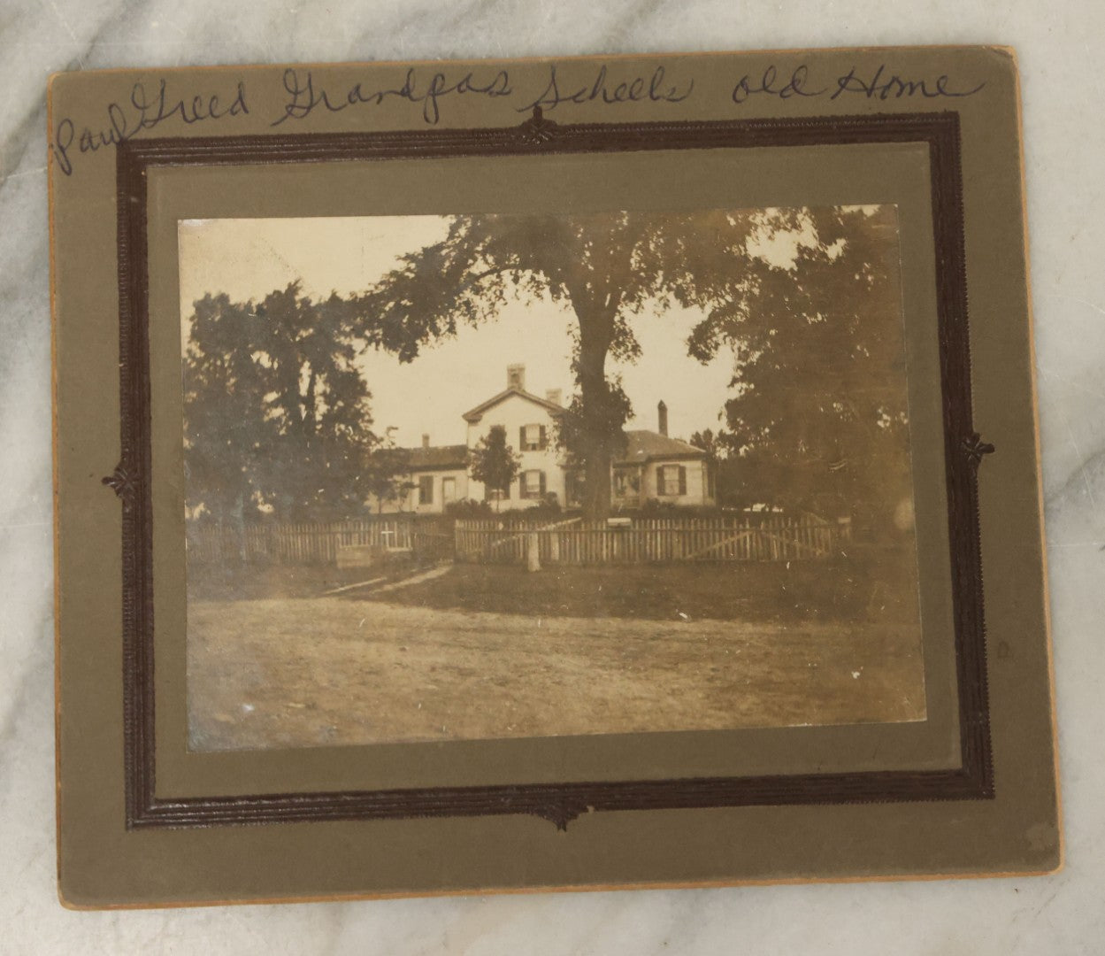 Lot 044 - Grouping Of Five Antique Boarded Photographs Including Worker Posing With Machinery, Exterior Of House, Women Standing By Tree, Horse-Drawn Carriage, And Baby
