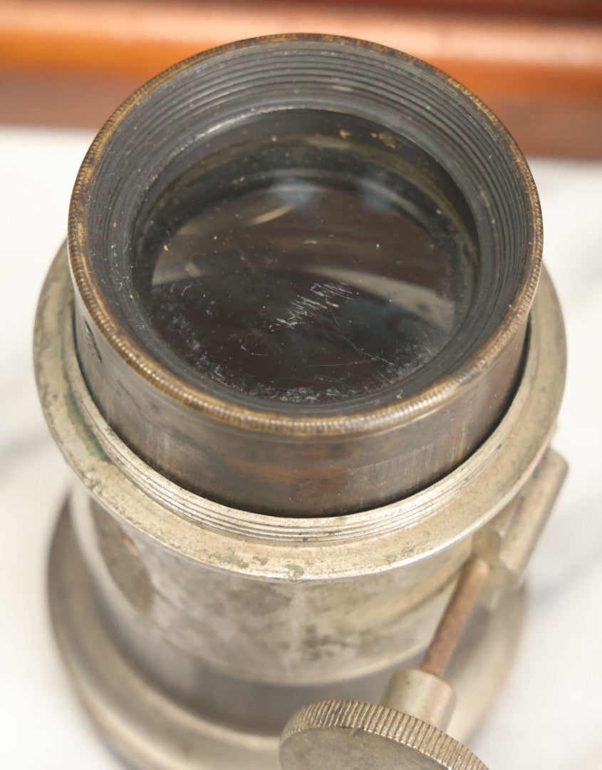 Lot 001 - Antique Wooden Camera By American Optical Company, Scovill Manufacturing Company, Proprietors, With New York, With Lens (Does Not Fit Camera) And Case From M.B. Loughman Photographic Apparatus, Boston - See Condition Notes