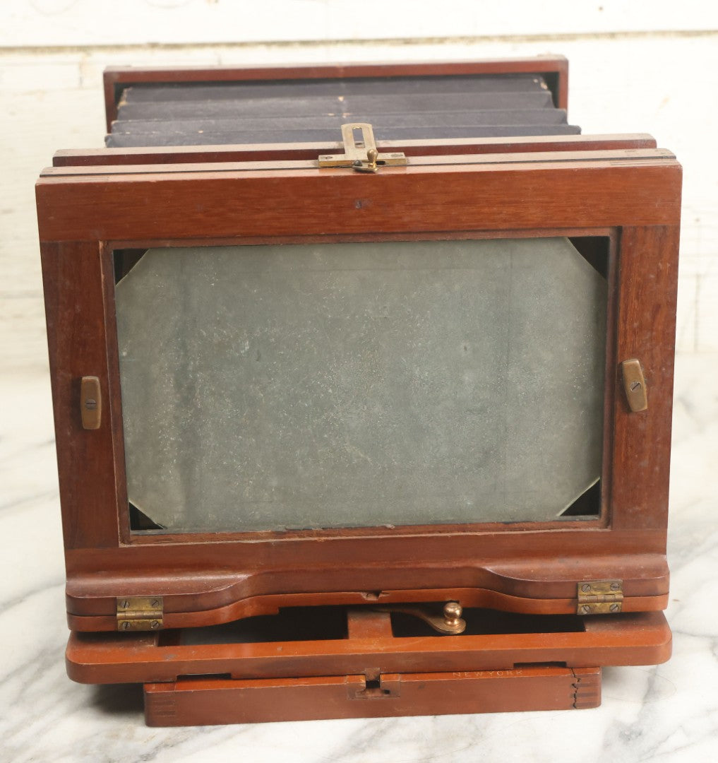 Lot 001 - Antique Wooden Camera By American Optical Company, Scovill Manufacturing Company, Proprietors, With New York, With Lens (Does Not Fit Camera) And Case From M.B. Loughman Photographic Apparatus, Boston - See Condition Notes