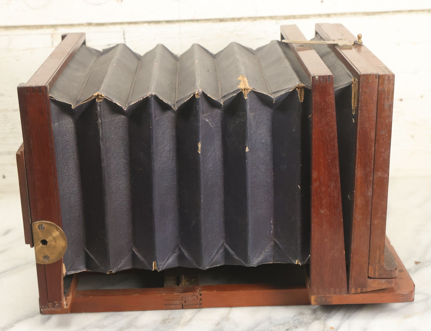 Lot 001 - Antique Wooden Camera By American Optical Company, Scovill Manufacturing Company, Proprietors, With New York, With Lens (Does Not Fit Camera) And Case From M.B. Loughman Photographic Apparatus, Boston - See Condition Notes