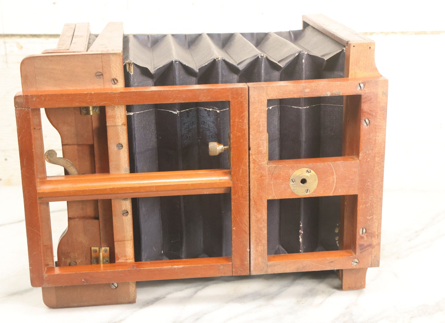 Lot 001 - Antique Wooden Camera By American Optical Company, Scovill Manufacturing Company, Proprietors, With New York, With Lens (Does Not Fit Camera) And Case From M.B. Loughman Photographic Apparatus, Boston - See Condition Notes