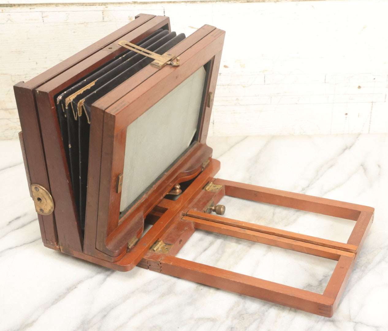Lot 001 - Antique Wooden Camera By American Optical Company, Scovill Manufacturing Company, Proprietors, With New York, With Lens (Does Not Fit Camera) And Case From M.B. Loughman Photographic Apparatus, Boston - See Condition Notes