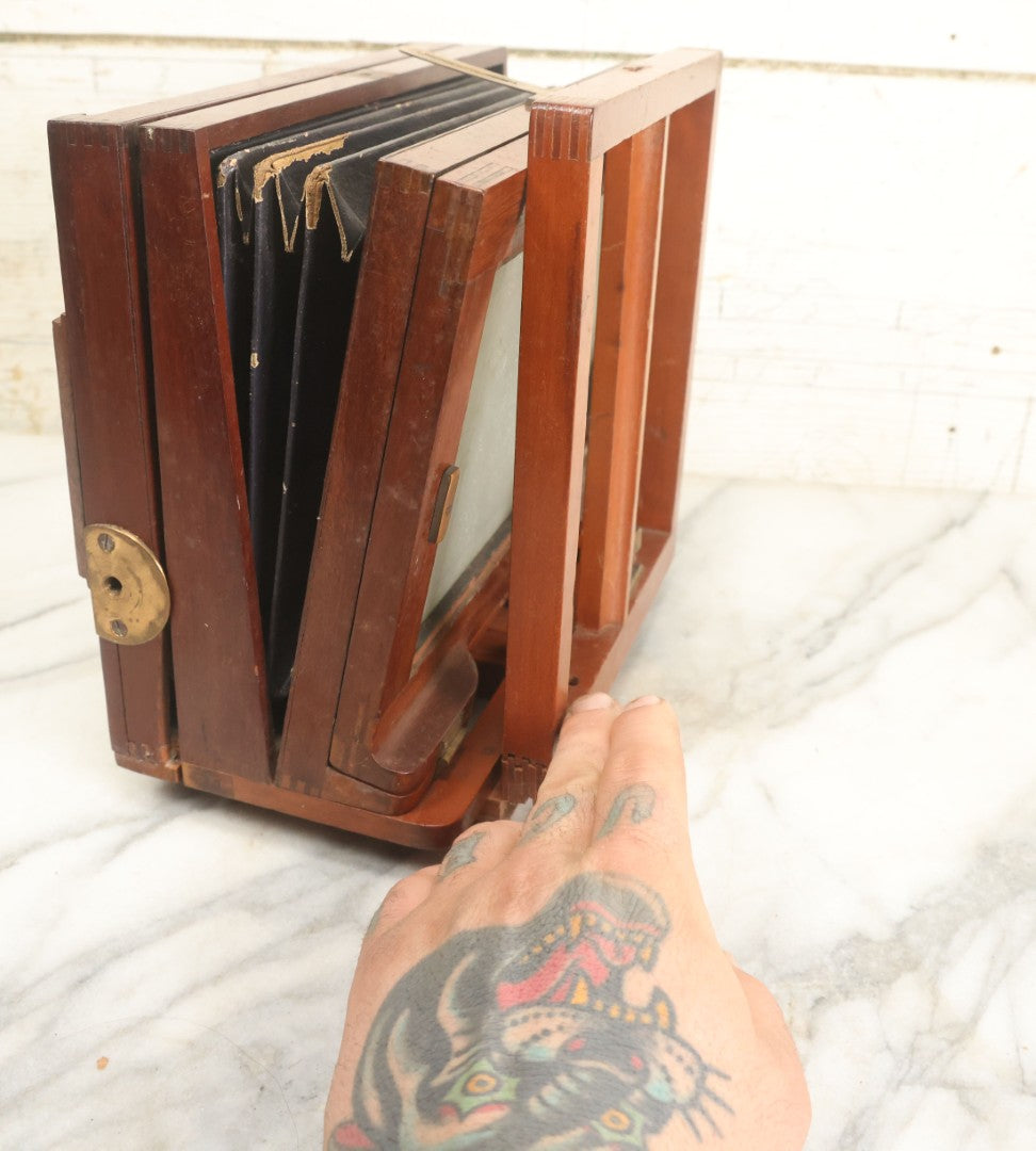 Lot 001 - Antique Wooden Camera By American Optical Company, Scovill Manufacturing Company, Proprietors, With New York, With Lens (Does Not Fit Camera) And Case From M.B. Loughman Photographic Apparatus, Boston - See Condition Notes