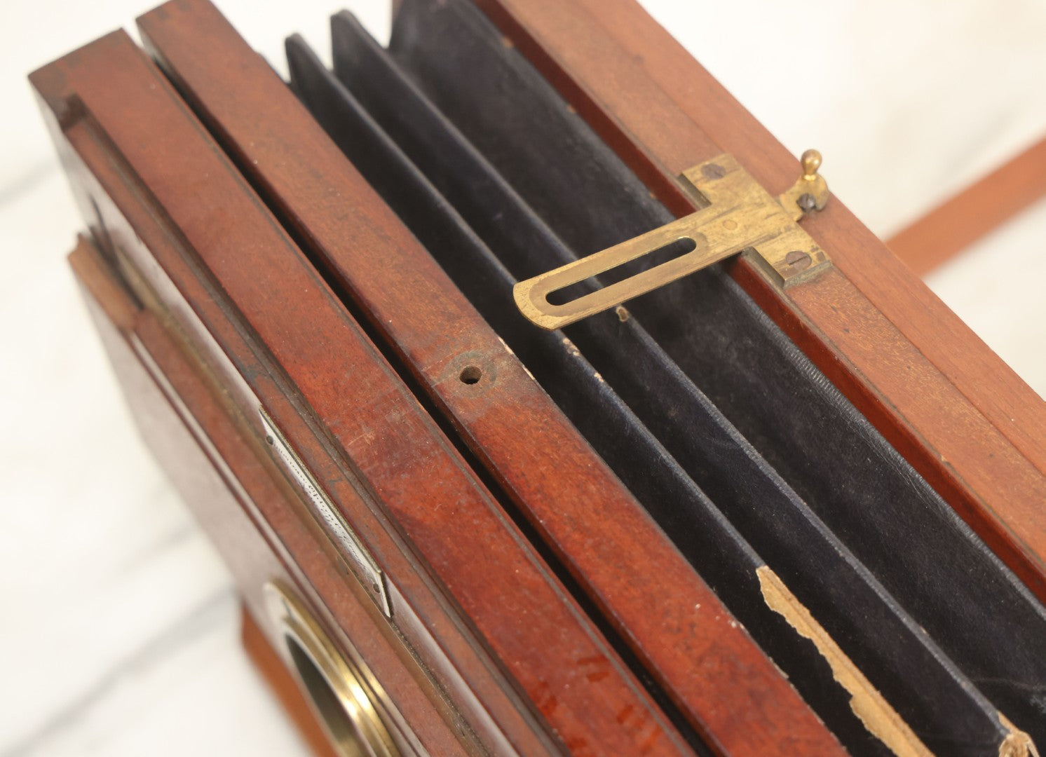 Lot 001 - Antique Wooden Camera By American Optical Company, Scovill Manufacturing Company, Proprietors, With New York, With Lens (Does Not Fit Camera) And Case From M.B. Loughman Photographic Apparatus, Boston - See Condition Notes