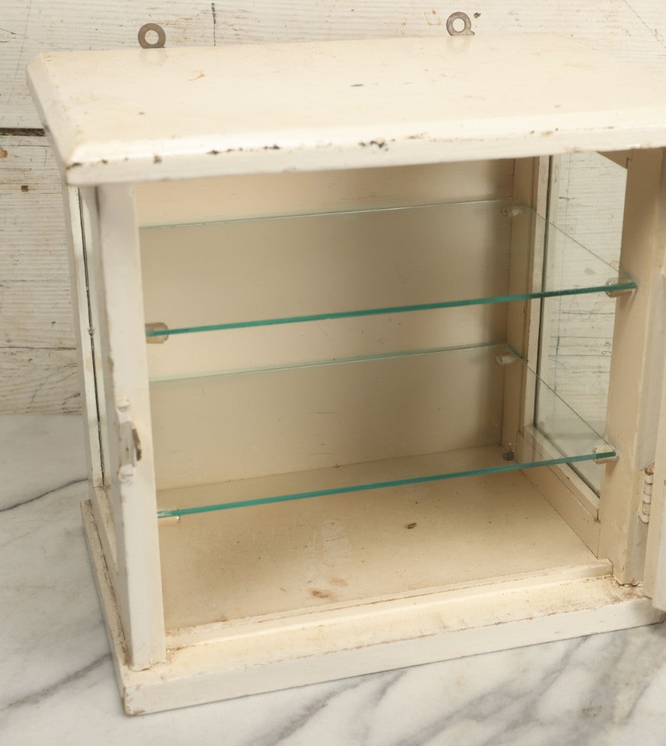 Lot 003 - Antique Wooden Barber Shop Antiseptic Sterilizer Cabinet With Glass Sides, Two Glass Shelves, And White Paint, Some Chipping To Shelves, Overall Dimensions Of Cabinet 13"L x 8-1/2"W x 12"H