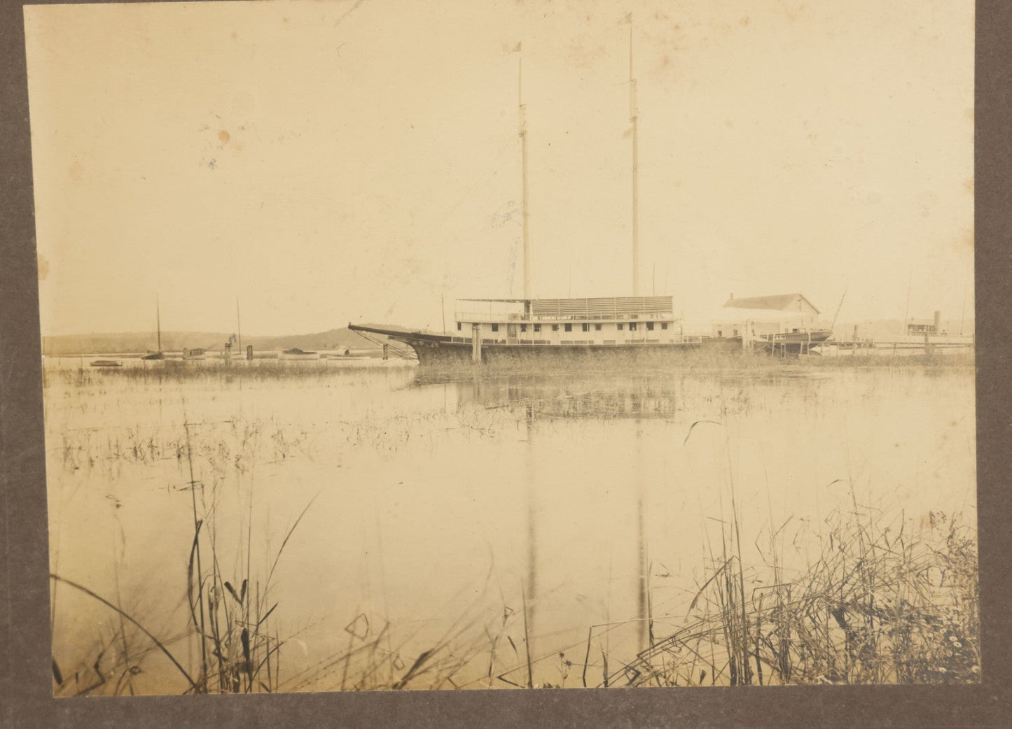 Lot 099 - Pair Of Antique Boarded Photographs Of  19th Century Wooden Yacht Schooner "Dauntless," Photographed In Essex Connecticut, Circa 1905